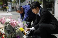 亡き妻子に「愛している」