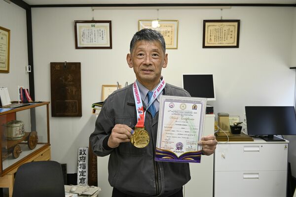 男子４００メートル（６０～６４歳）で優勝した島田嘉紀さん