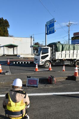 装着率を検査する調査員