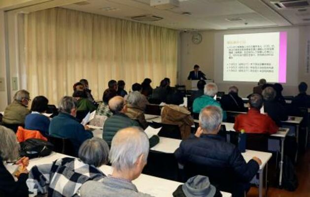 熊本県弁護士会が開いたシンポジウム=13日午後、熊本市