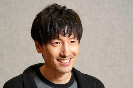　インタビューに答える澤野弘之＝東京都千代田区