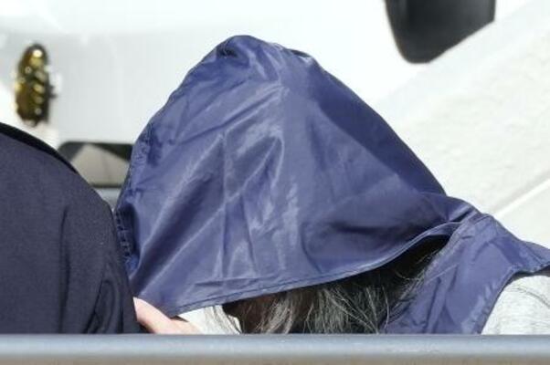 　２月、送検のため福岡・早良署を出る吉井辰夫容疑者