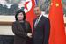　握手する北朝鮮の崔善姫外相（左）と中国の王毅外相＝２８日、北京（国営中国国際テレビの「微博（ウェイボ）」公式アカウントから、共同）