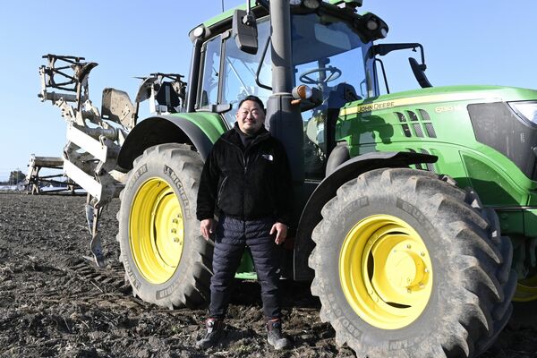農地を集約し、土地利用型農業を進める「雄」の猪野代表取締役＝真岡市
