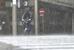 台風6号の影響で雨が強まる中、自転車で走る男性=2日午後、宮崎市