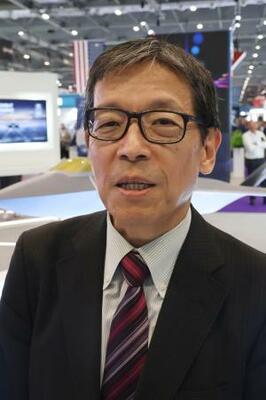 　次期戦闘機開発について話すＧＩＧＯトップの岡真臣氏＝９日、ロンドン（共同）