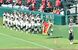 第１０５回全国高校野球選手権記念大会開会式で、引き締まった表情で行進する文星芸大付ナイン＝６日、阪神甲子園球場
