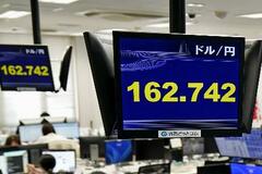 円下落、162円台後半