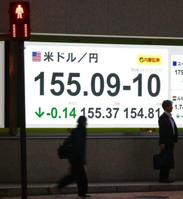 外国為替市場の対米ドルの円相場を表示するボード=18日午後、東京都中央区