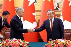 中国とカナダの首相、北京で会談