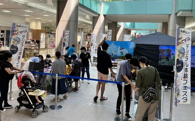 ８月に開催したデジタル体験フェスタ＝宇都宮市内（ヨコタ提供）