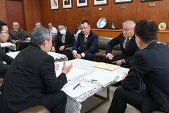 住民が再編反対署名