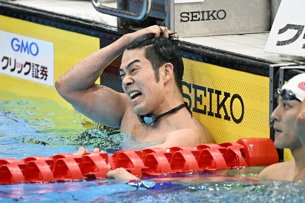 男子１００メートルバタフライ決勝　５位となり顔をしかめる水沼（新潟医療福祉大職）＝東京アクアティクスセンター、森田大地撮影