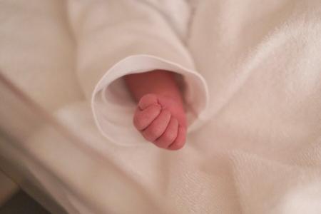 分娩(ぶんべん)台の上で、平和をあきらめないと誓った=筆者提供