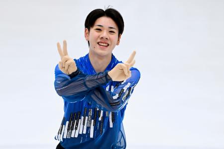 ジュニア男子SPの演技を終え、笑顔の田内誠悟=邦和みなとスポーツ&カルチャー
