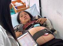 ブータン、遠隔の健診で母子見守り