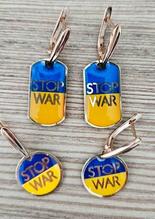 「組織的圧力」で宿舎の国旗撤去