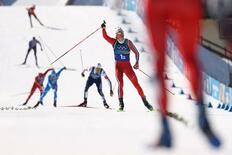 男子はノルウェーが３連覇