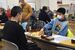 集中して対局に臨む下野杯争奪囲碁大会の出場者＝11日午前、宇都宮市