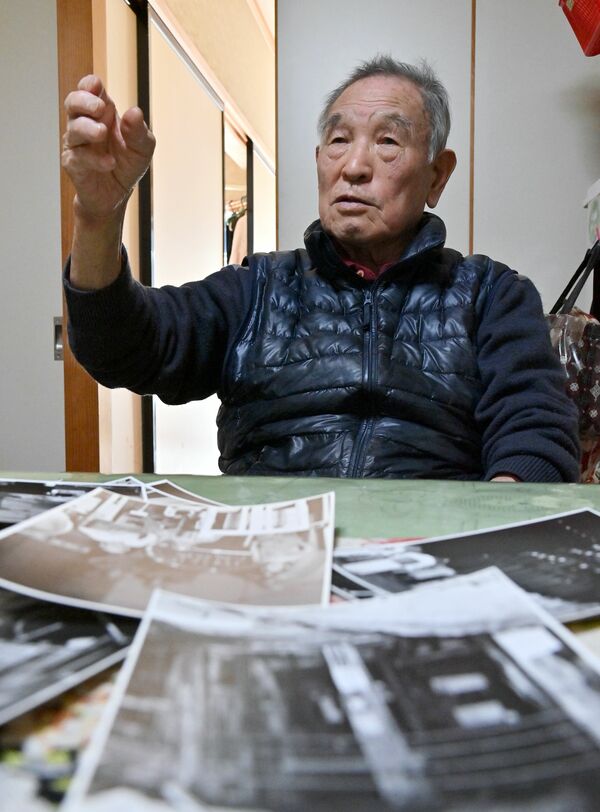 鉱員時代や閉山後の思い出を語る高田さん。今も妻と2人、足尾で暮らす=27日午前10時40分、日光市足尾地域
