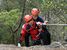 古賀志山での訓練で要救助者役を引き上げる県警山岳警備隊員＝12日午前、宇都宮市内