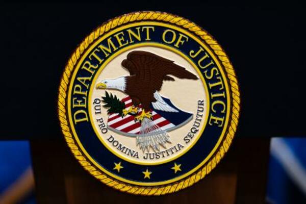 米司法省のロゴ=4日、ワシントン(AP=共同)