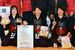 剣道成年女子で優勝し、笑顔を見せる本県チームの（右から）関口、飯塚、竹中＝４日午前10時10分、宇都宮市のユウケイ武道館