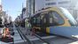 復線し、別車両にけん引されて出発したＬＲＴ＝19日午前11時15分、宇都宮市