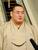 　大相撲のロンドン公演への出発前に、報道陣の取材に応じる横綱豊昇龍＝１２日、羽田空港