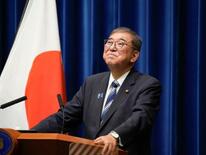 自民党員、落胆と安堵
