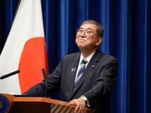 自民党員、落胆と安堵