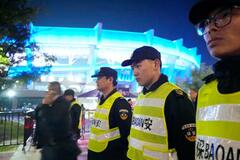 サッカー日中戦、警官ら多数動員