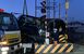 東武伊勢崎線の特急と衝突し、踏切から撤去される車＝25日午後５時15分、足利市福居町