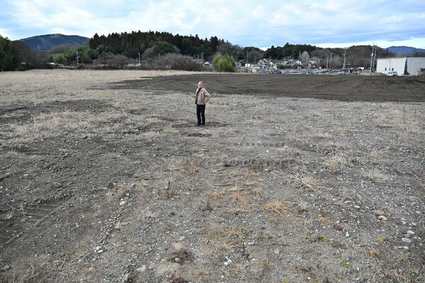 公共残土を使用し埋め戻し事業が完了した瓦作地区の陥没現場=22日、宇都宮市大谷町