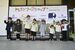 県内の鉄軌道事業者６社の制服などを着用して記念撮影する子どもたち＝16日午前、宇都宮市インターパーク６丁目