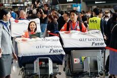 ミラノ五輪から日本選手団が帰国