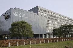 米国向け郵便物流８割減