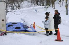 肘近くまで巻き込まれ