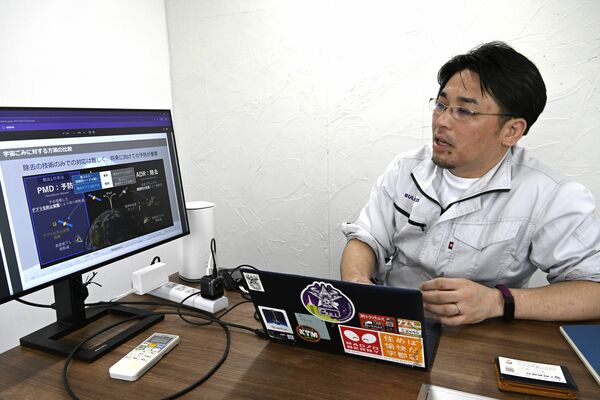 事業について説明する宇藤社長