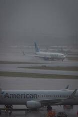 米競合との合併構想断念