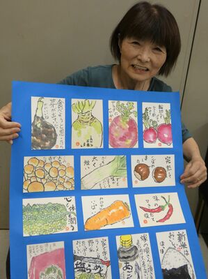 展示作品を紹介する谷口さん