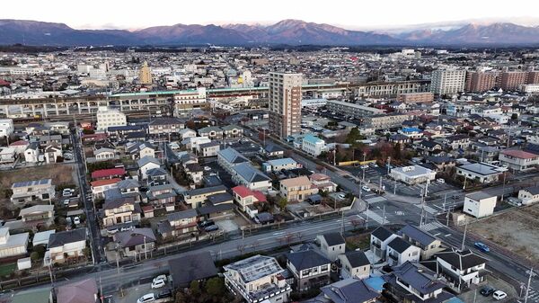 住宅街が広がるJR西那須野駅南東。戦中、この地に1発の爆弾が投下されたが空襲の痕跡は残っていない=1月、那須塩原市南町、ドローンから、磯真奈美撮影