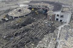 旧大川小津波で大量流木確認