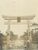 １９３０年ごろに建てられた当時の藤崎八旛宮の大鳥居。写真奥に続く参道は土がむき出しの歩道で、現在の車道は戦後に整備されたという（藤崎八旛宮提供）