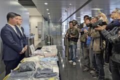 香港１０億円強奪で１５人逮捕