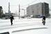 真っ白に雪化粧した今市地区の市街地＝24日午前９時50分、日光市中央町