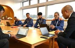 山火事消火、実績を報告