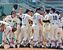 ２年連続で優勝し、マウンドに集まって喜ぶ作新ナイン＝４日午後０時15分、清原球場