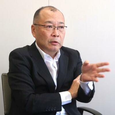 インタビューに答える日産自動車で国内やASEAN事業を統括する山崎庄平氏=8日、横浜市