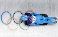 中傷越え、誇り胸に滑走